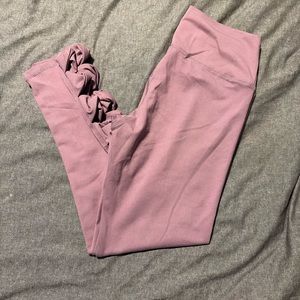 Never worn. Light purple leggings with detail at bottom